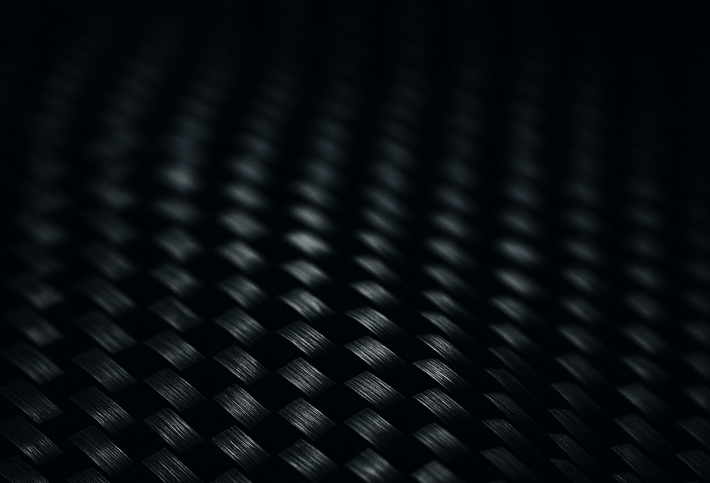 Black textured pattern resembling carbon fiber on a black background